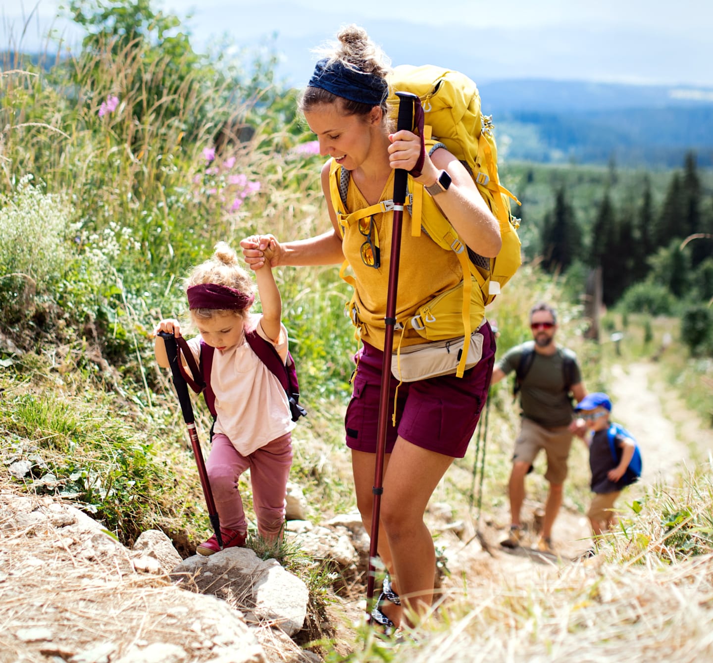 Family on hiking trail.