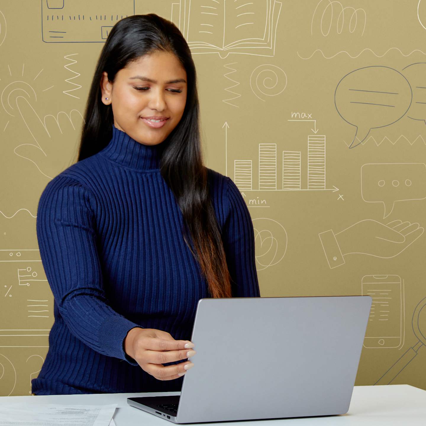 Woman looking at laptop.