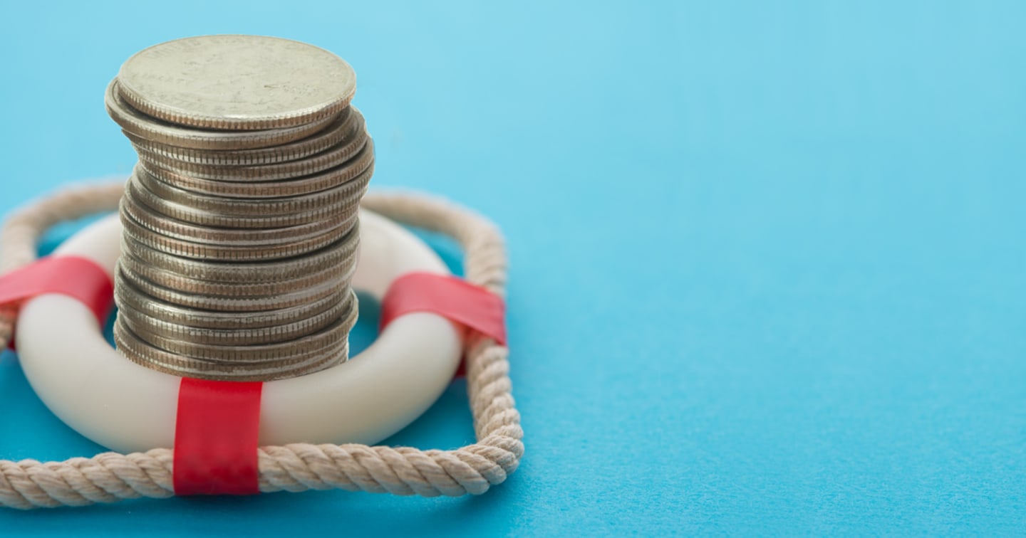 Styled image of a life preserver with a stack of quarters in the middle.