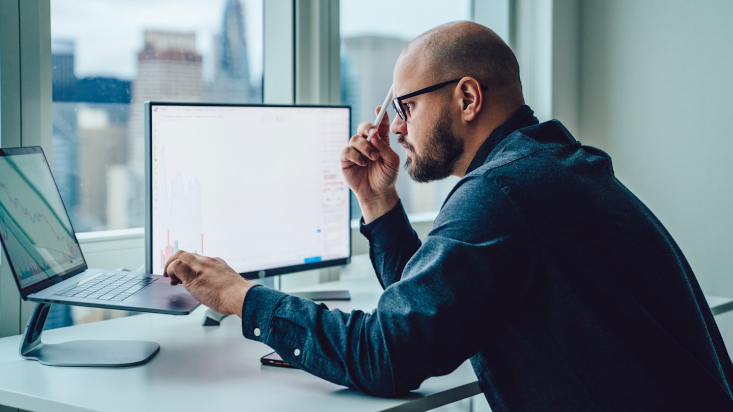 Man working on computer. 