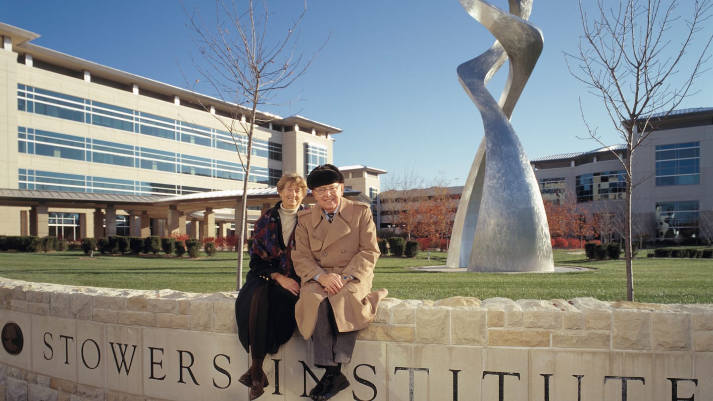 Jim and Virginia Stowers sitting in front of the Stowers Institute for Medical Research in Kansas City, Missouri.