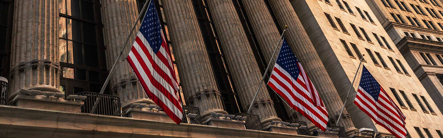 United States flags on a government building.