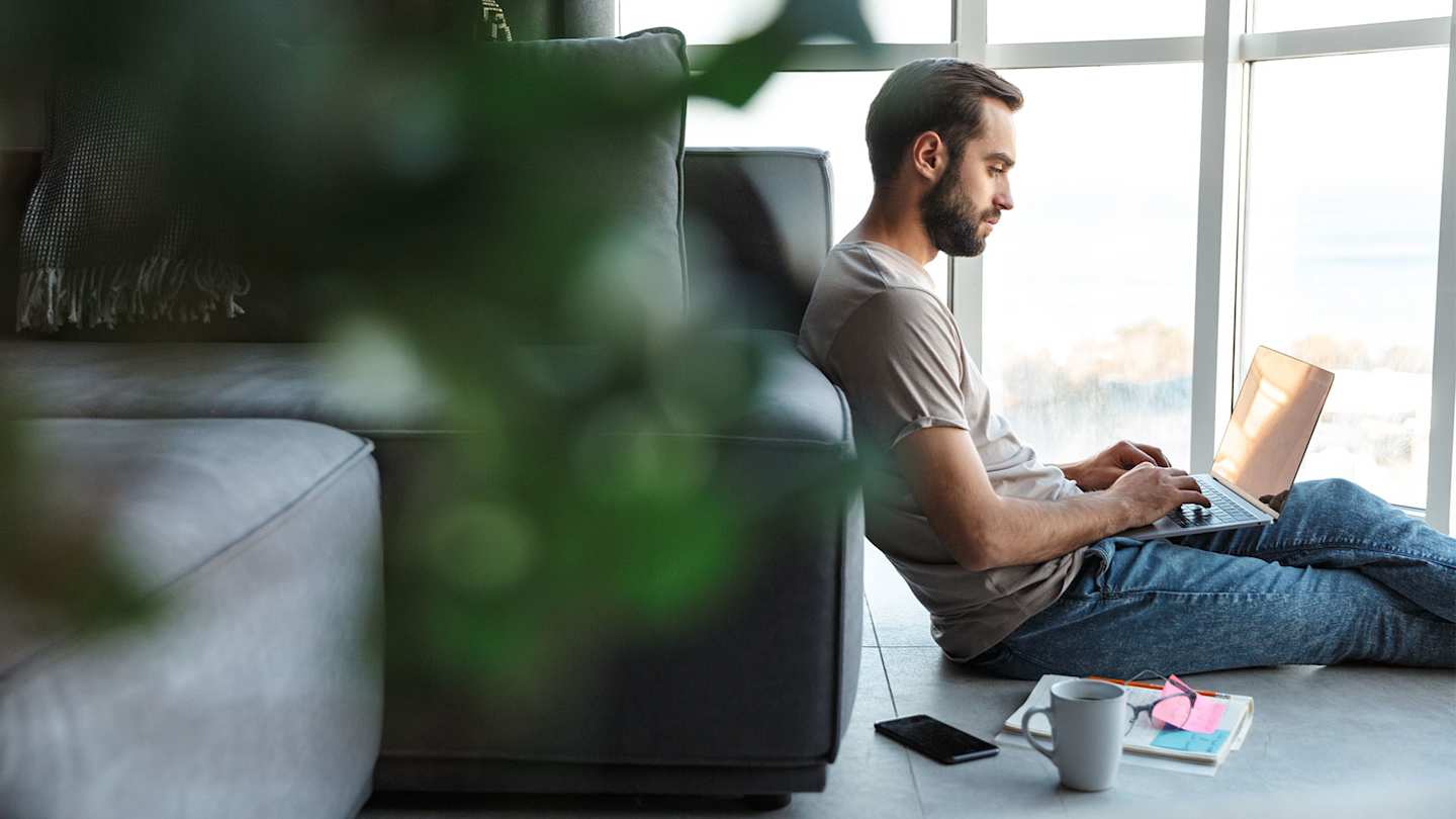 Man on laptop.