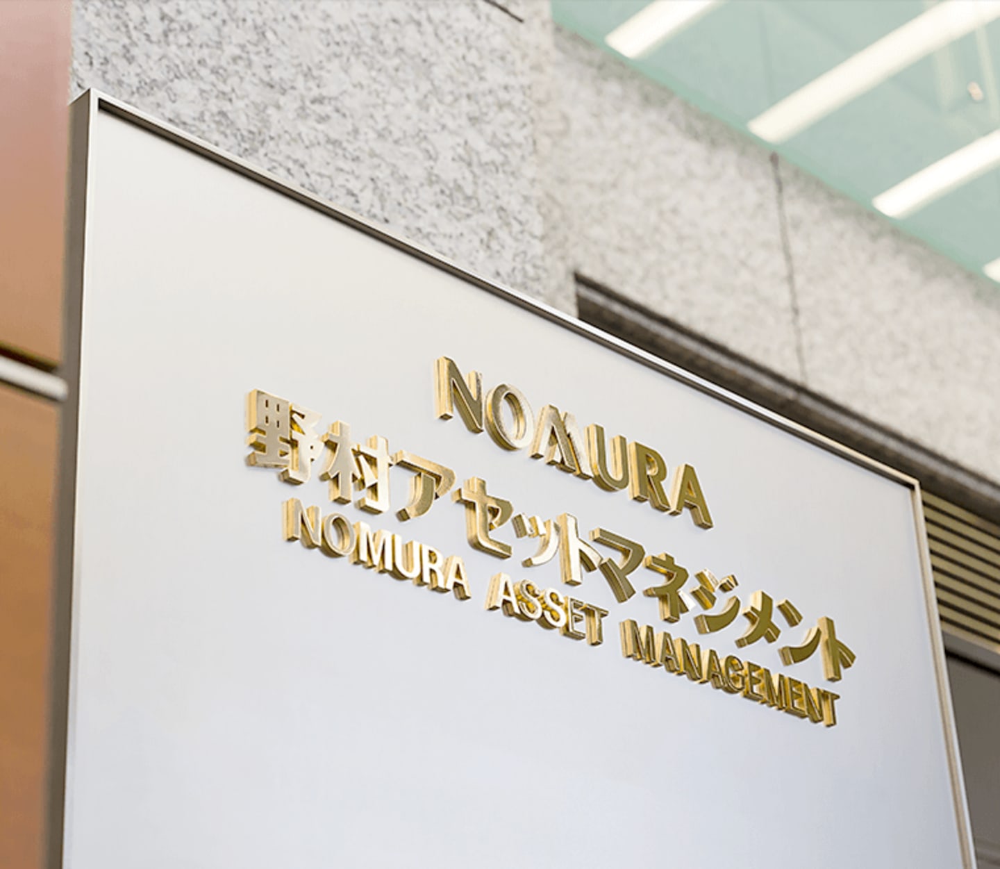 Nomura Asset Management Sign.