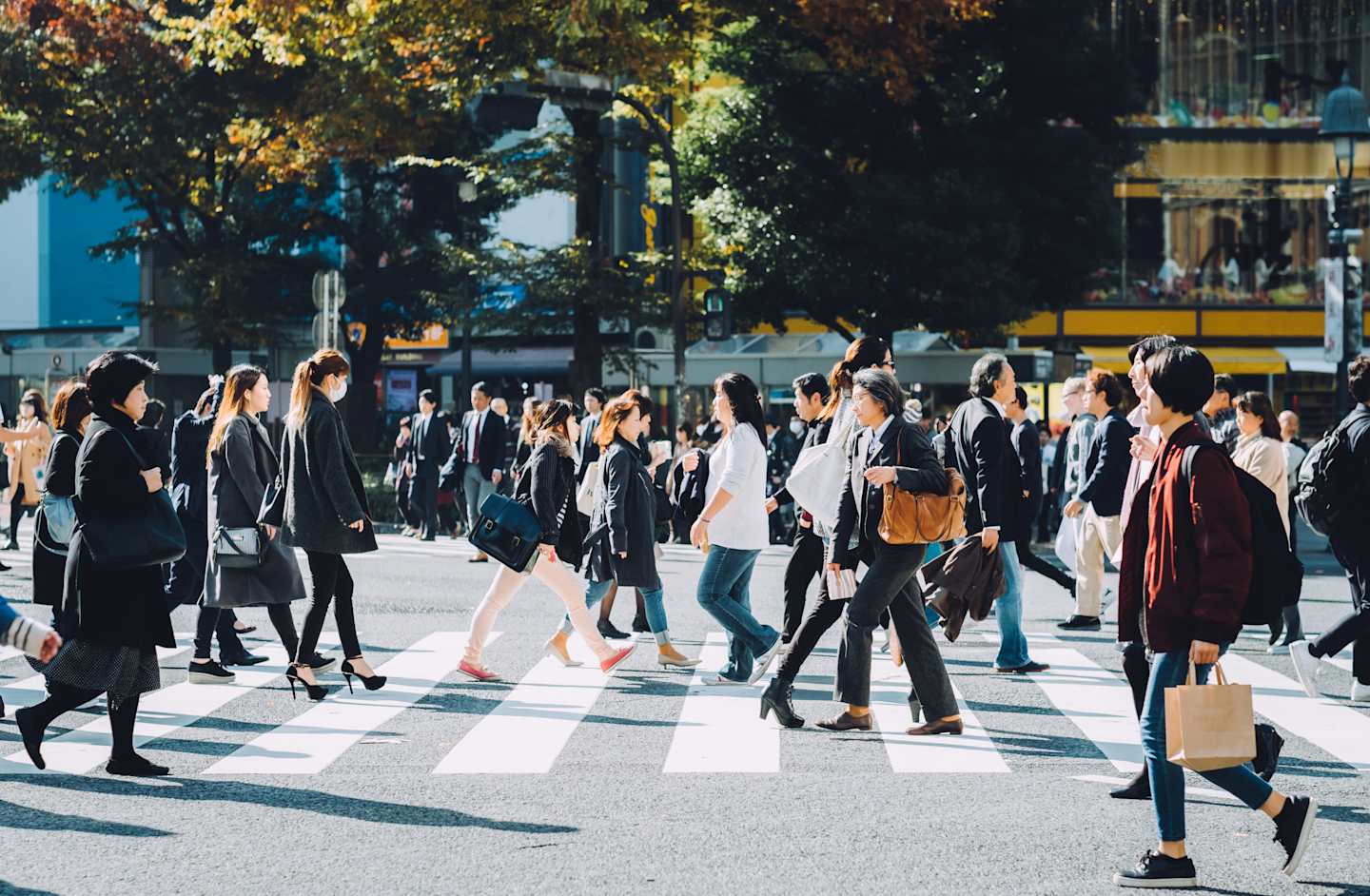 Many people on the crosswalk.