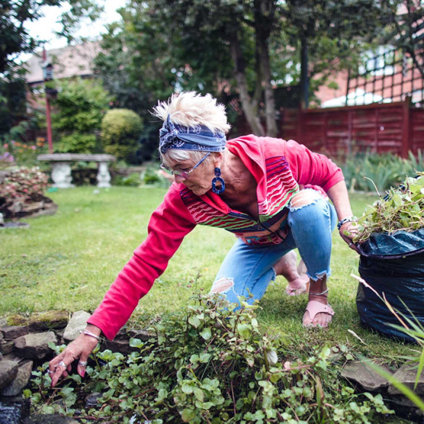 Woman working in garden.