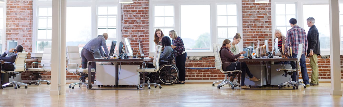 Open floorplan office with workers.