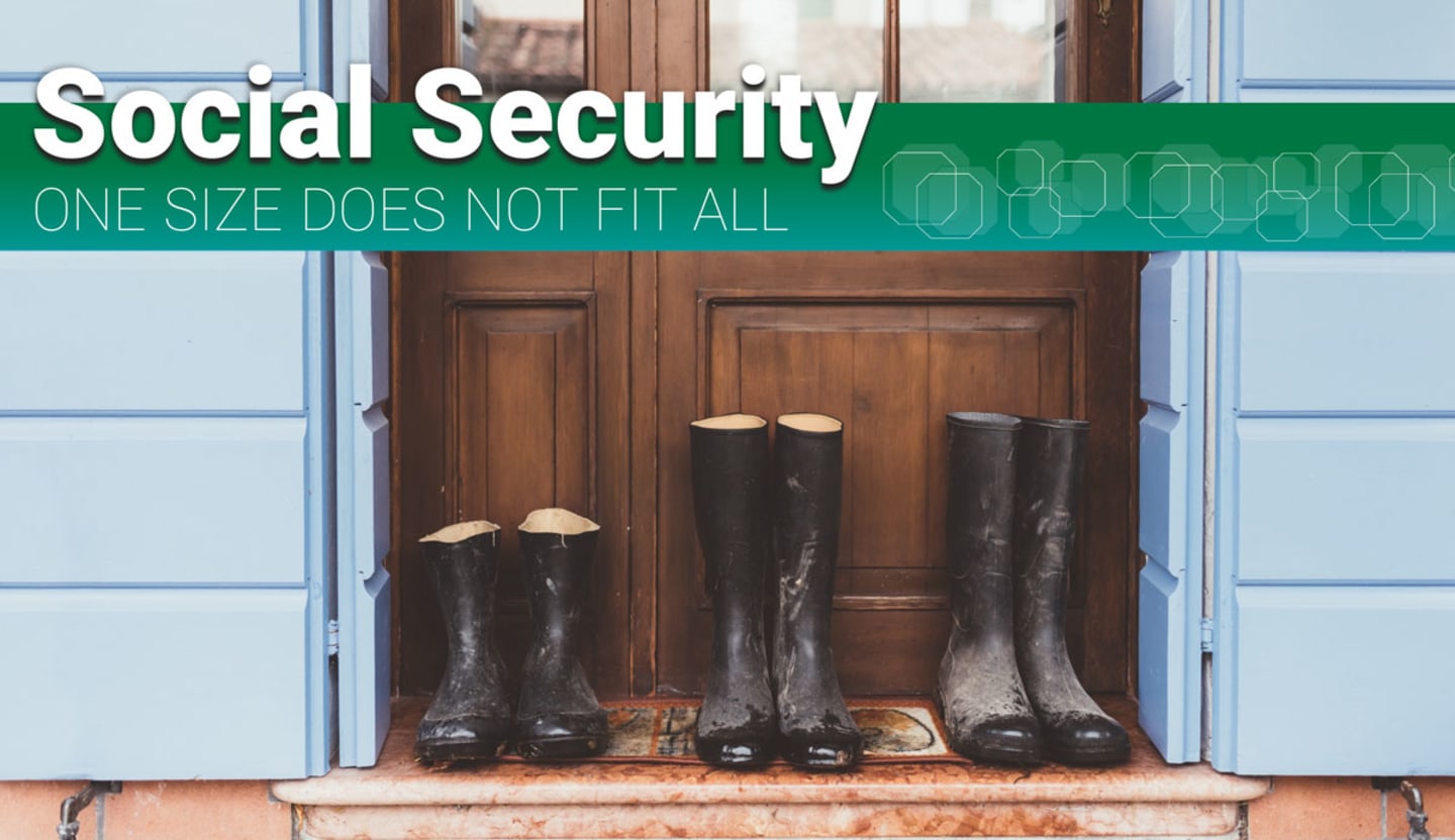 A front porch with three different sizes of boots on the door mat.