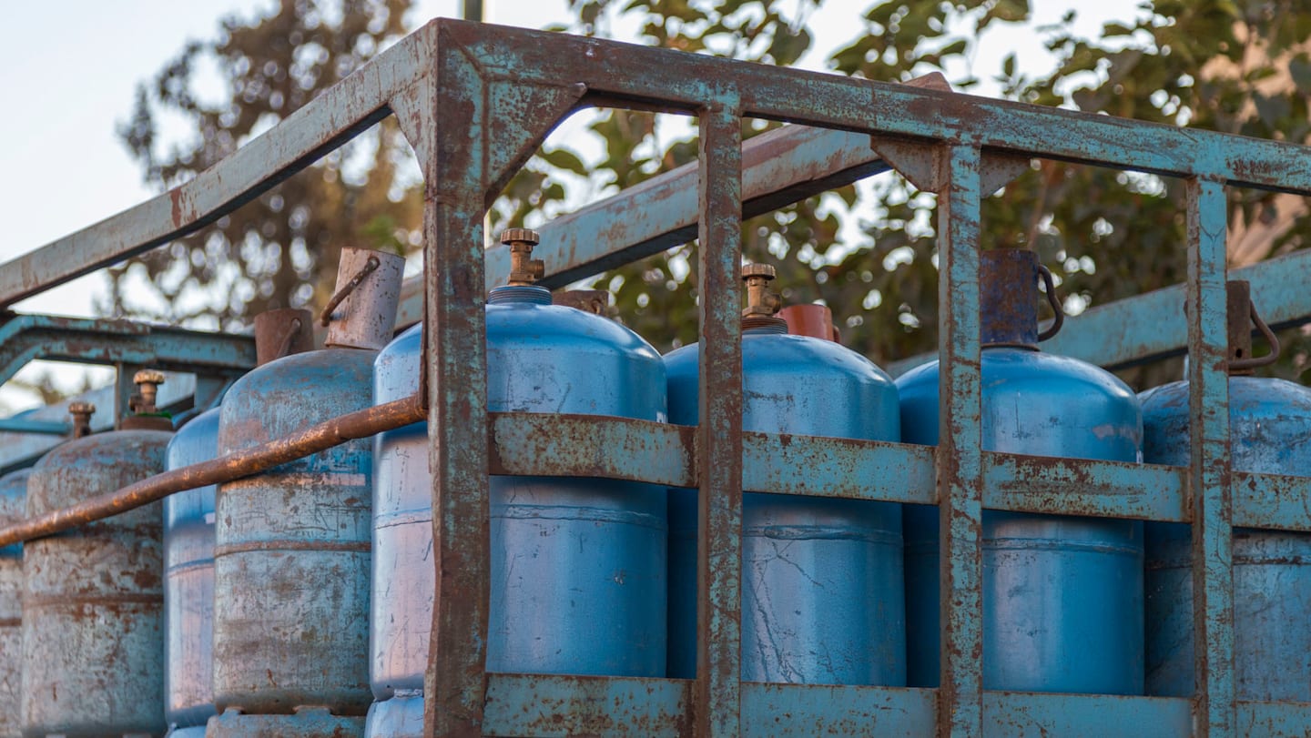 Gas containers in the back of a truck.