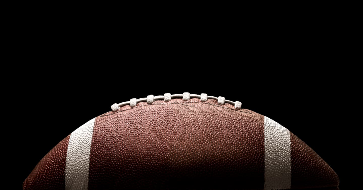 Close-up of football on black background