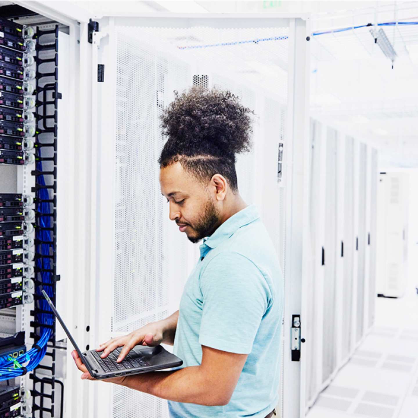 IT worker in server room.