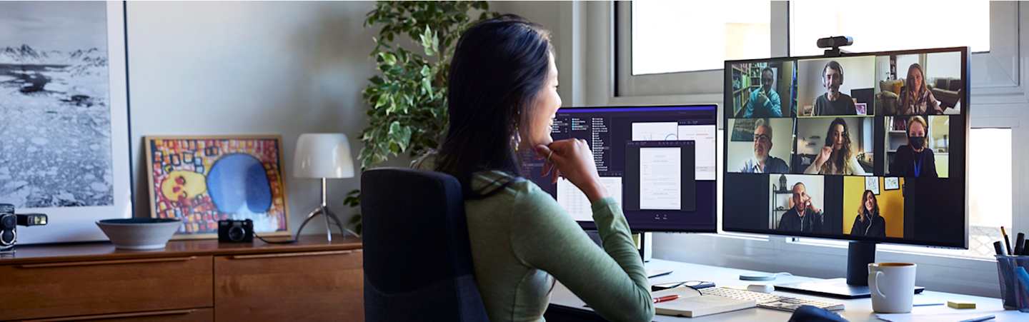 Woman on video conference call in office.